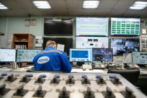 Continuous Improvement Manager working in a control room