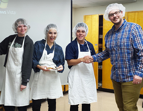 Food industry personnel shaking hands